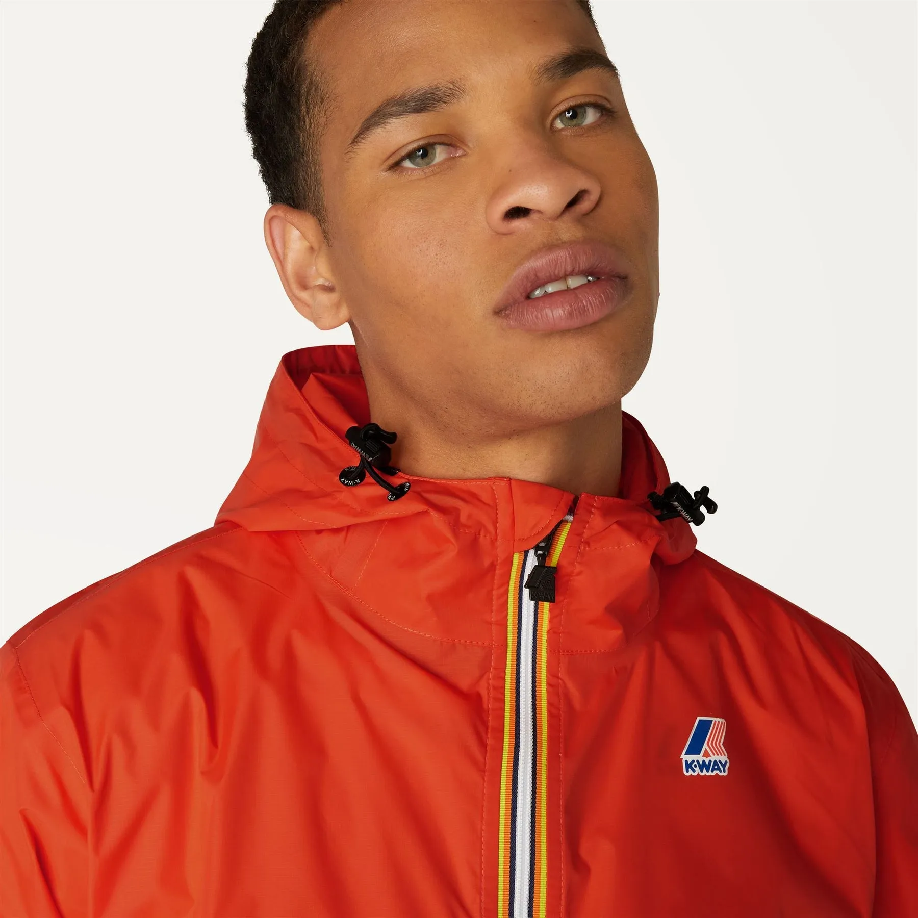Claude - Unisex Packable Full Zip Waterproof  Rain Jacket in Orange